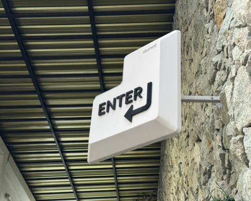 A photo of a sign that says enter